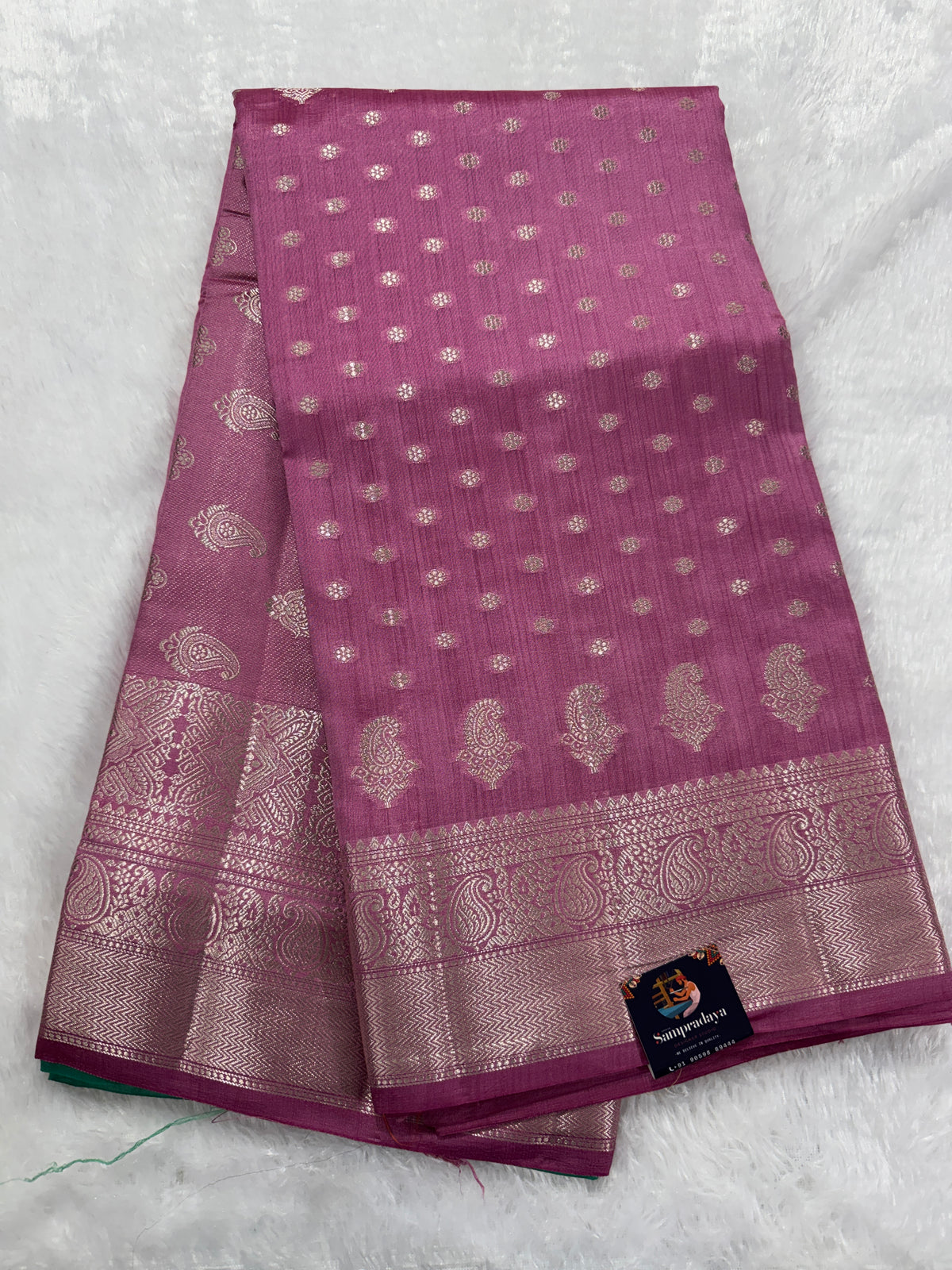 Pure Chiniya Silk Saree Baby Pink Colored Elegantly Paired with a Gold Zari Border.