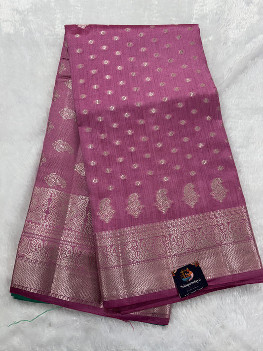 Pure Chiniya Silk Saree Baby Pink Colored Elegantly Paired with a Gold Zari Border.