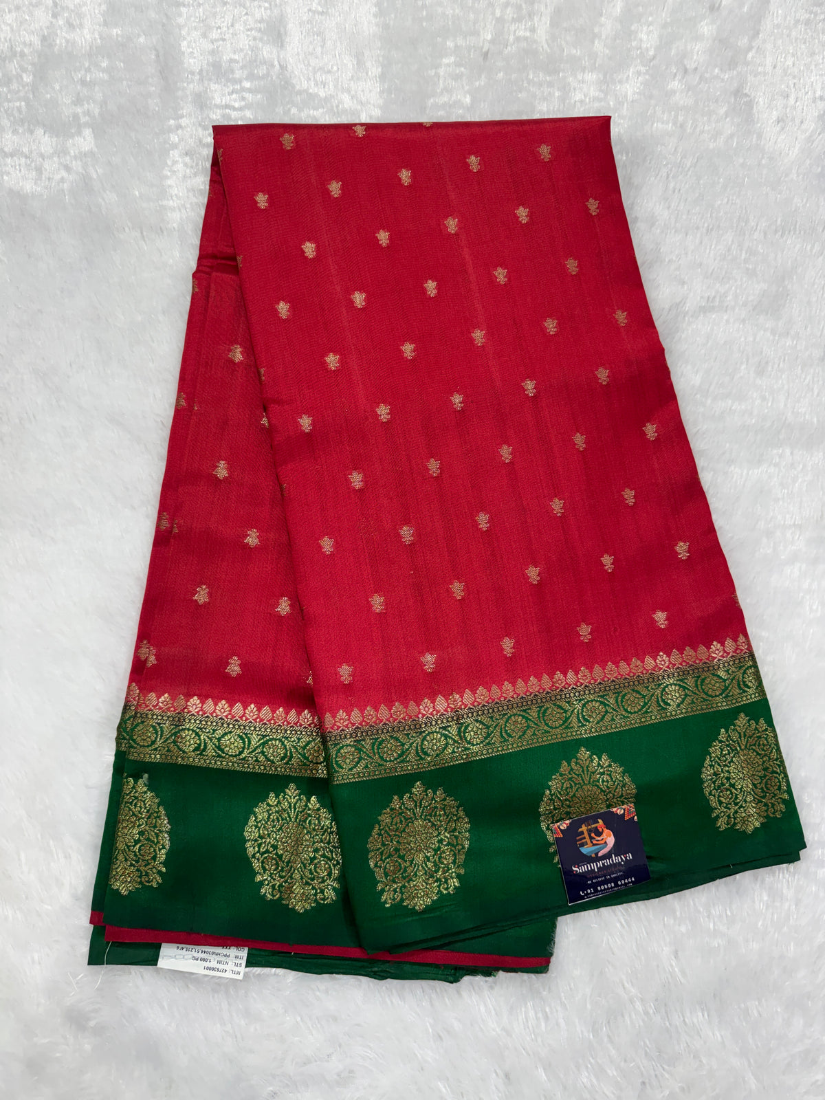Pure Chiniya Silk Saree Red Colored Elegantly Paired with a Gold Zari Border.