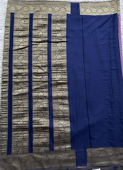 Semi Georgette Saree Lavender Colored Elegantly Paired with a Zari Border. - Sampradaya Designer Studio