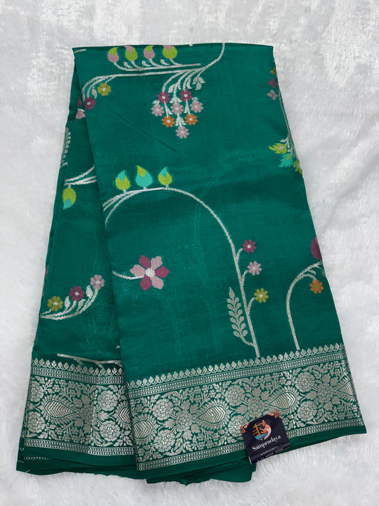 Pure Chiniya Silk Saree Rama Green Colored Elegantly Paired with a Gold Zari Border.