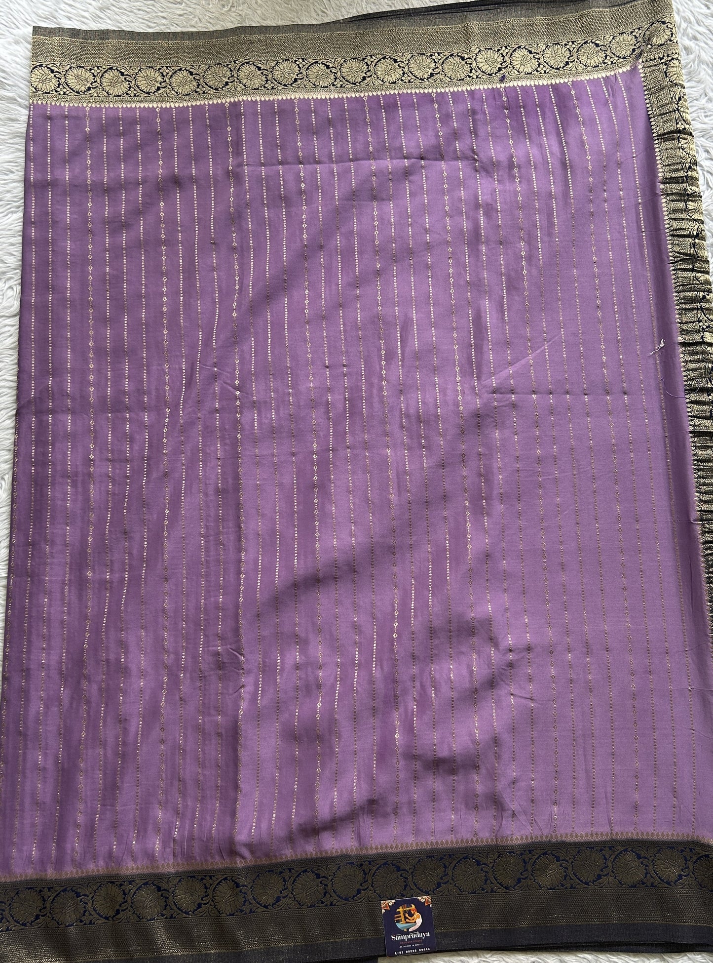 Semi Georgette Saree Lavender Colored Elegantly Paired with a Zari Border. - Sampradaya Designer Studio