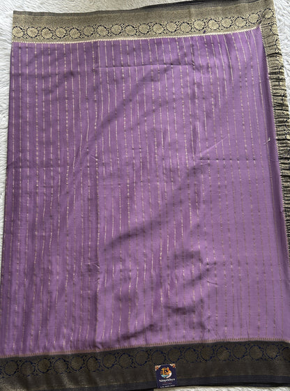 Semi Georgette Saree Lavender Colored Elegantly Paired with a Zari Border. - Sampradaya Designer Studio