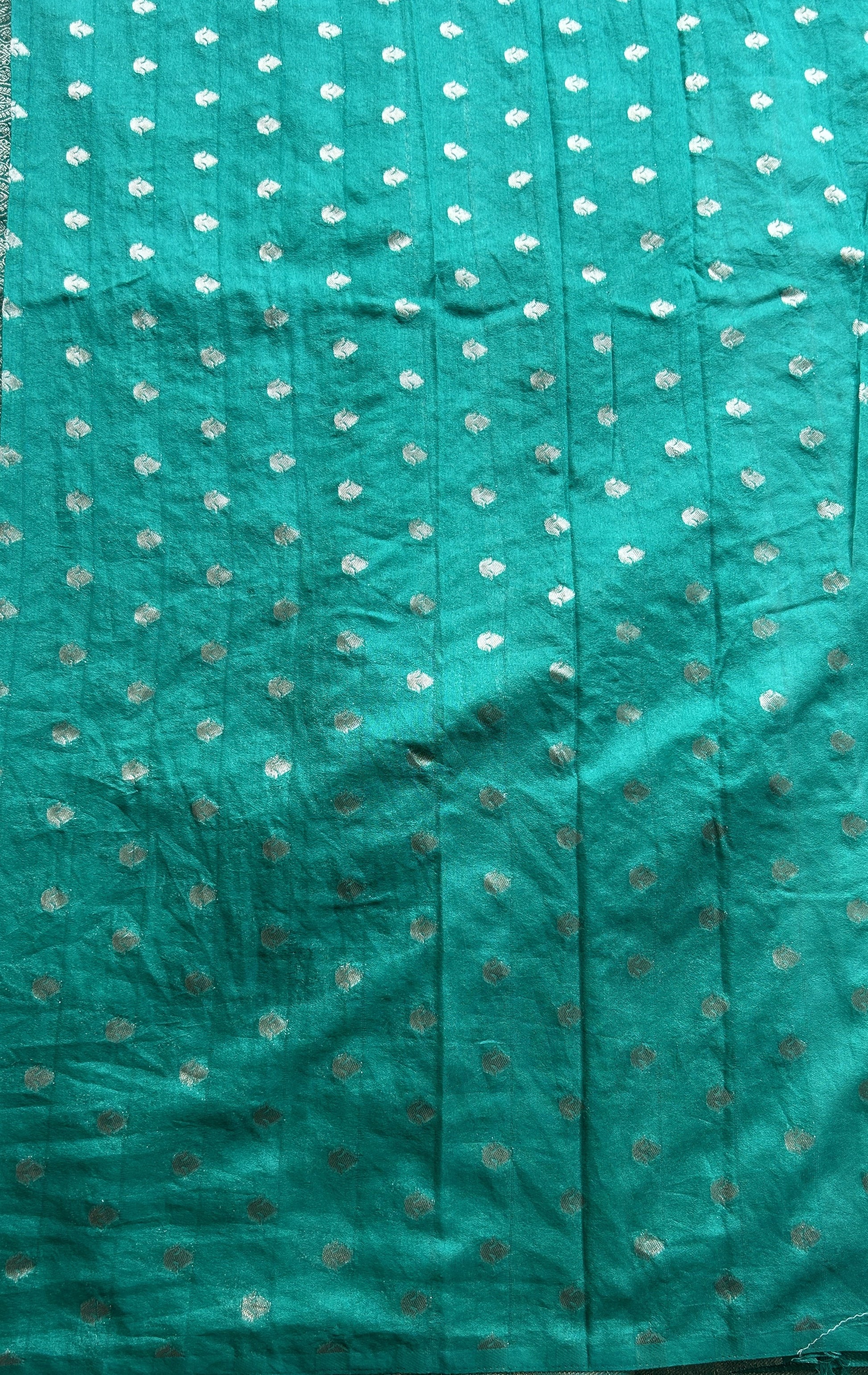 Semi Georgette Saree Sea Green Colored Elegantly Paired with a Zari Border. - Sampradaya Designer Studio
