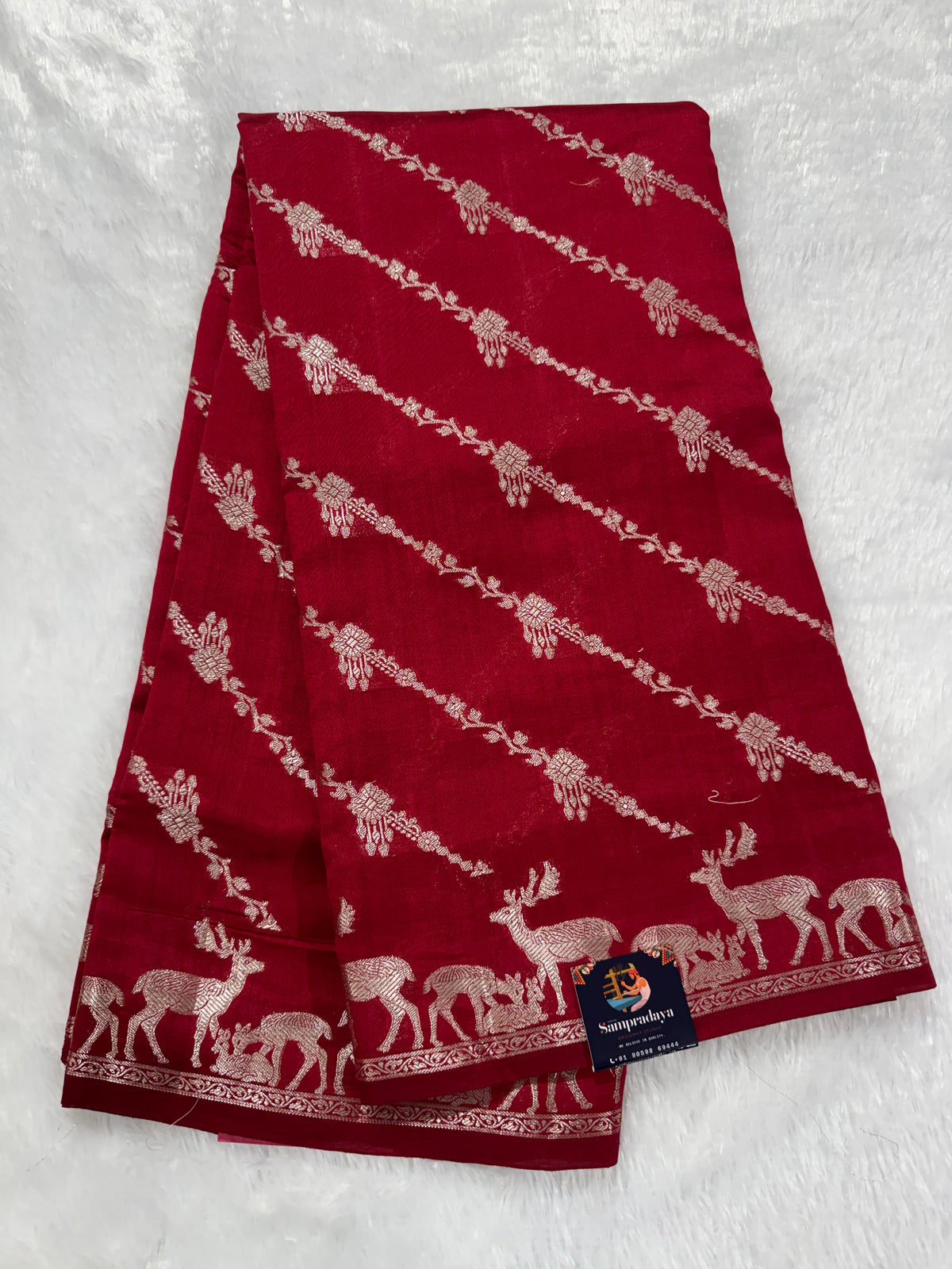 Pure Chiniya Silk Saree Red Colored Elegantly Paired with a Gold Zari Border.