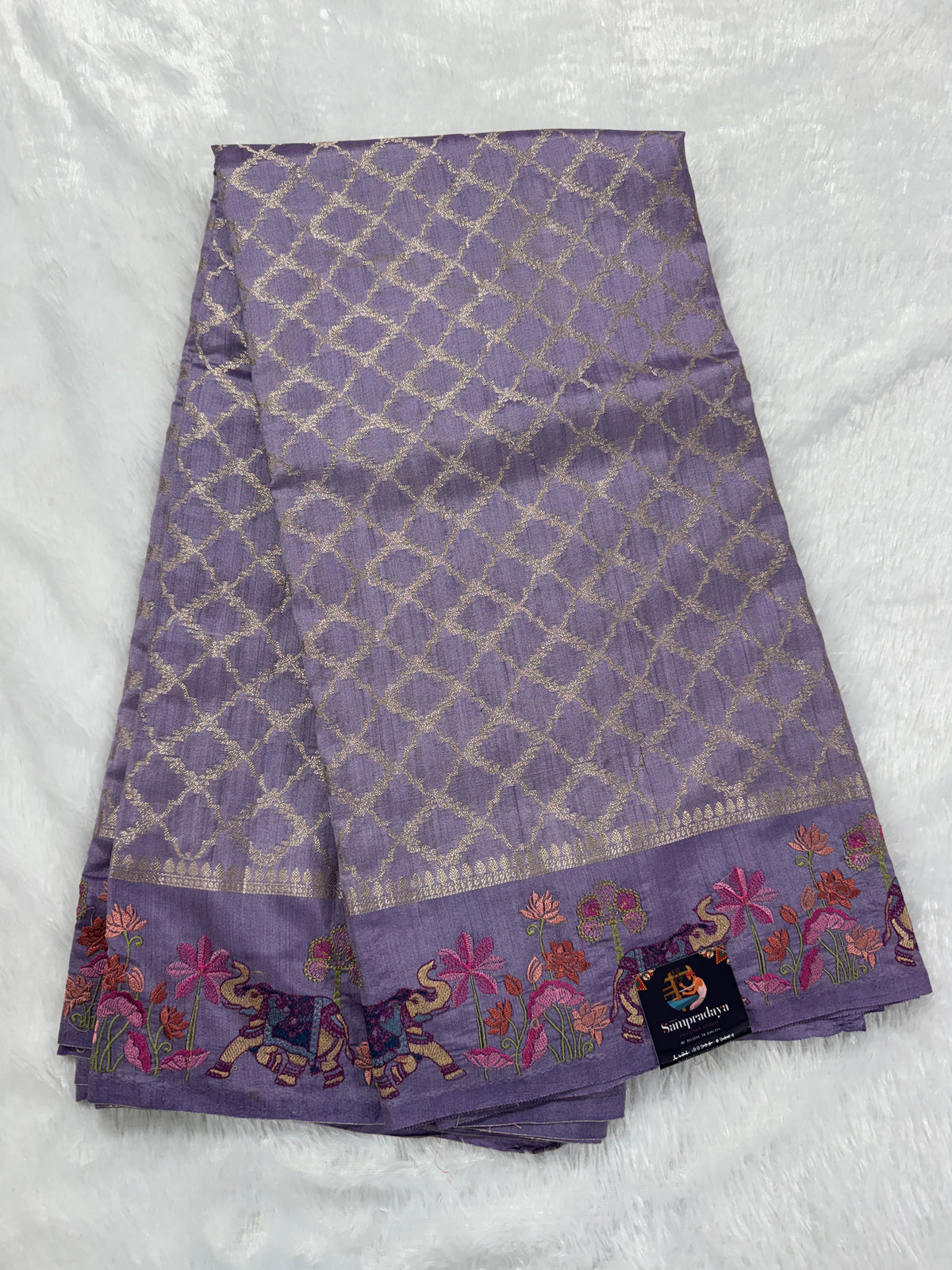 Pure Chiniya Silk Saree Lavender Colored Elegantly Paired with a Gold Zari Border
