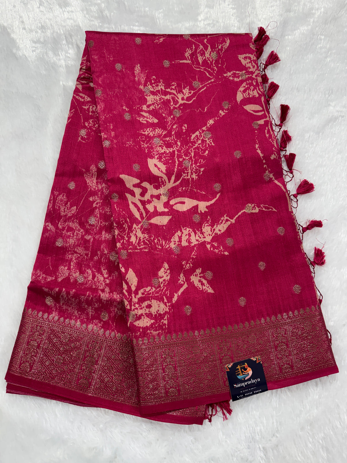 Pure Chiniya Silk Saree Pink Colored Elegantly Paired with a Gold Zari Border.