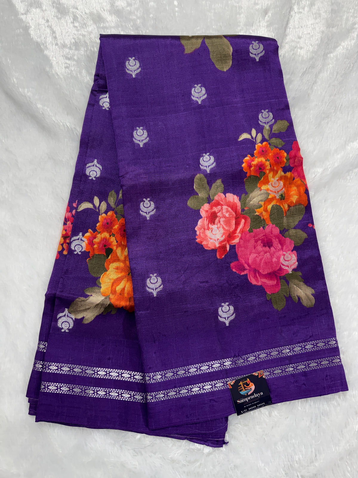 Pure Chiniya Silk Saree Purple Colored Elegantly Paired with a Gold Zari Border.
