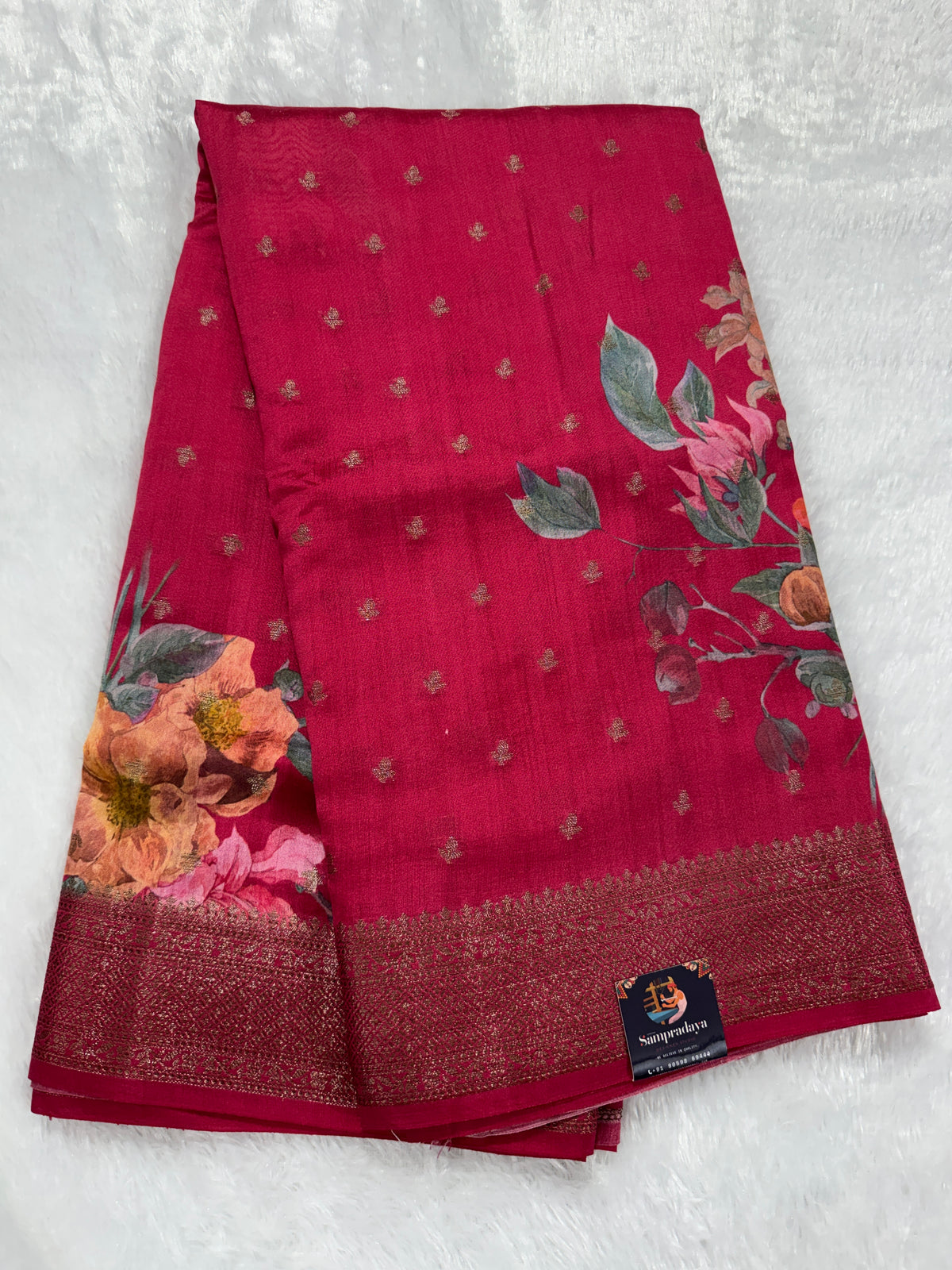 Pure Chiniya Silk Saree Pink Colored Elegantly Paired with a Gold Zari Border.