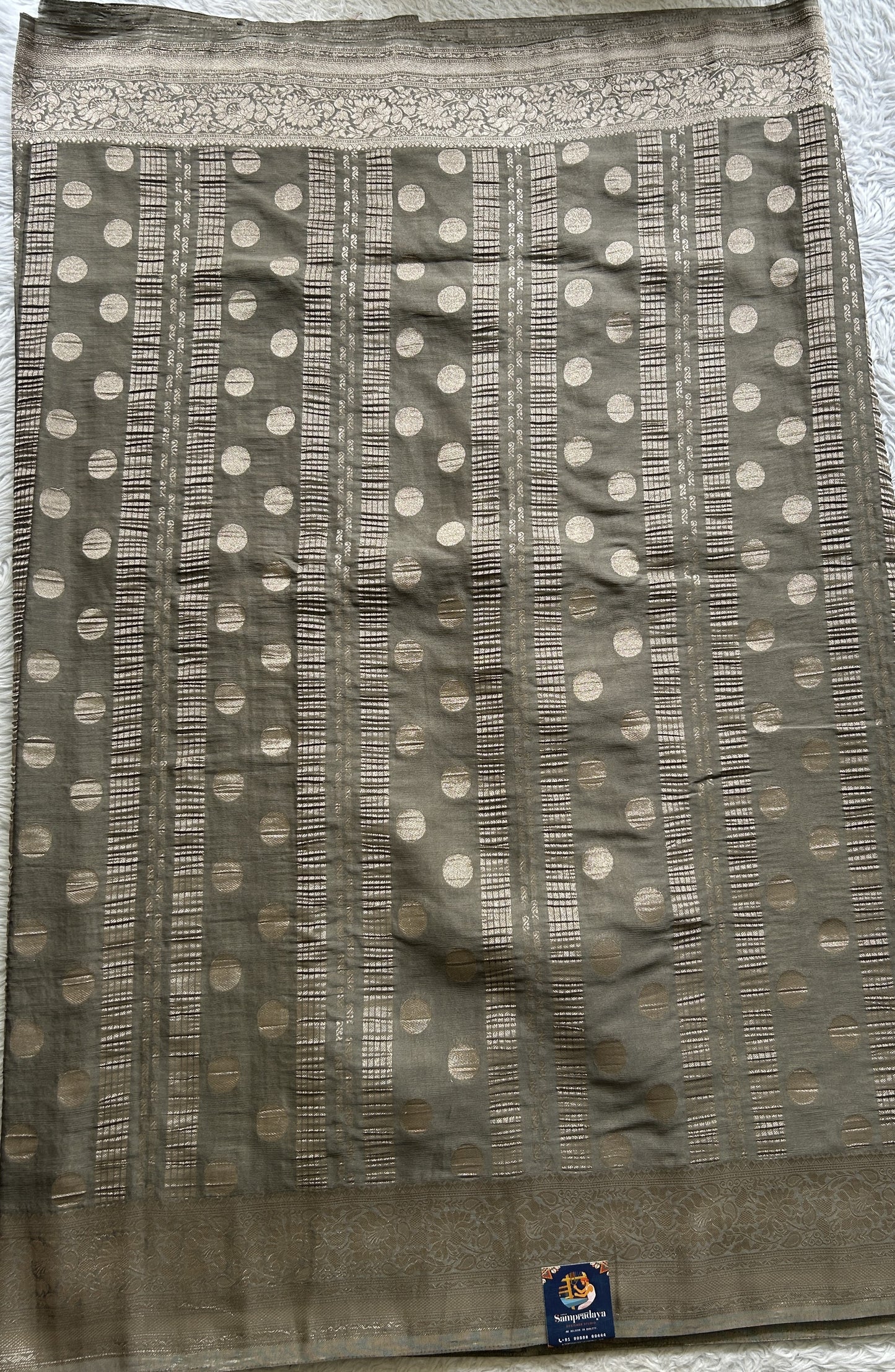 Semi Georgette Saree Gray Colored Elegantly Paired with a Zari Border. - Sampradaya Designer Studio