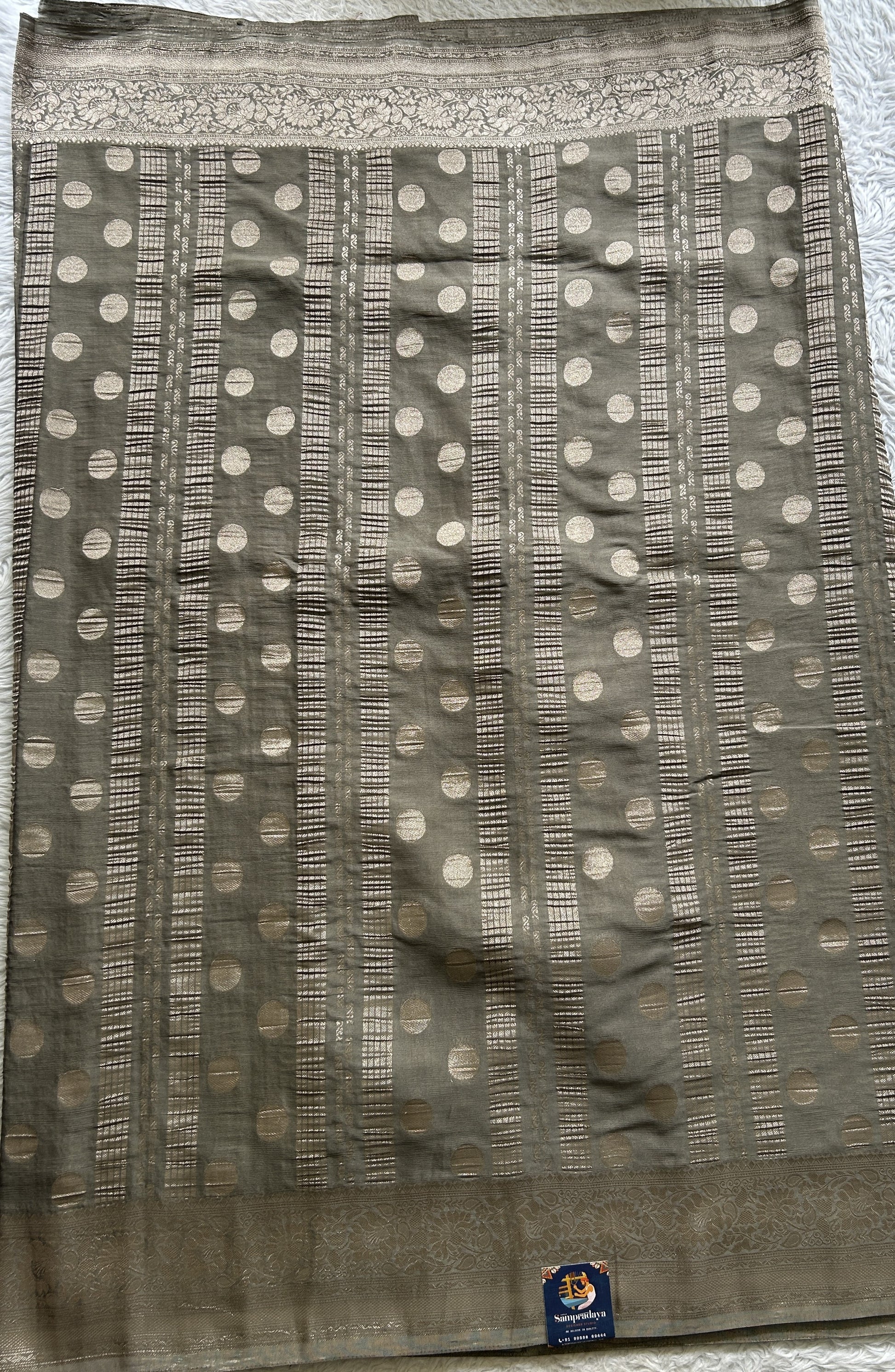 Semi Georgette Saree Gray Colored Elegantly Paired with a Zari Border. - Sampradaya Designer Studio