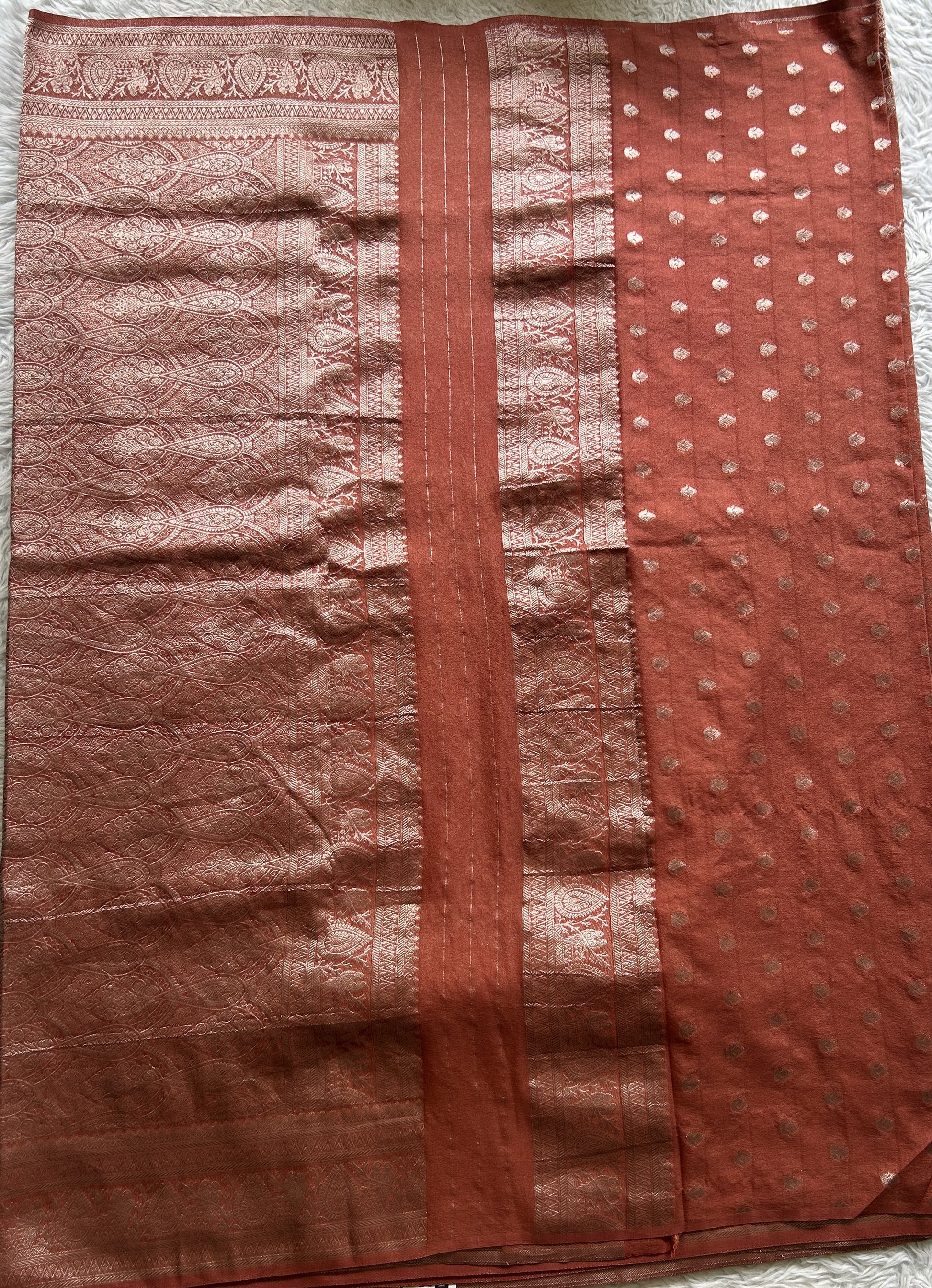 Semi Georgette Saree Rust Colored Elegantly Paired with a Zari Border. - Sampradaya Designer Studio