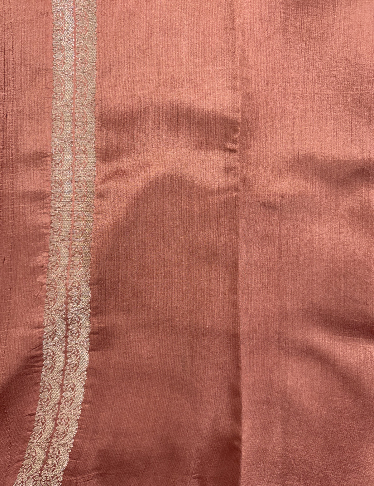 Pure Chiniya Silk Saree Peach Colored Elegantly Paired with a Gold Zari Border