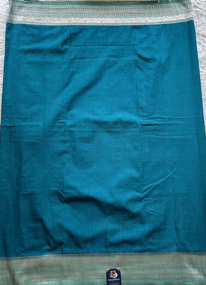 Semi Georgette Saree Sea Blue Colored Elegantly Paired with a Zari Border. - Sampradaya Designer Studio