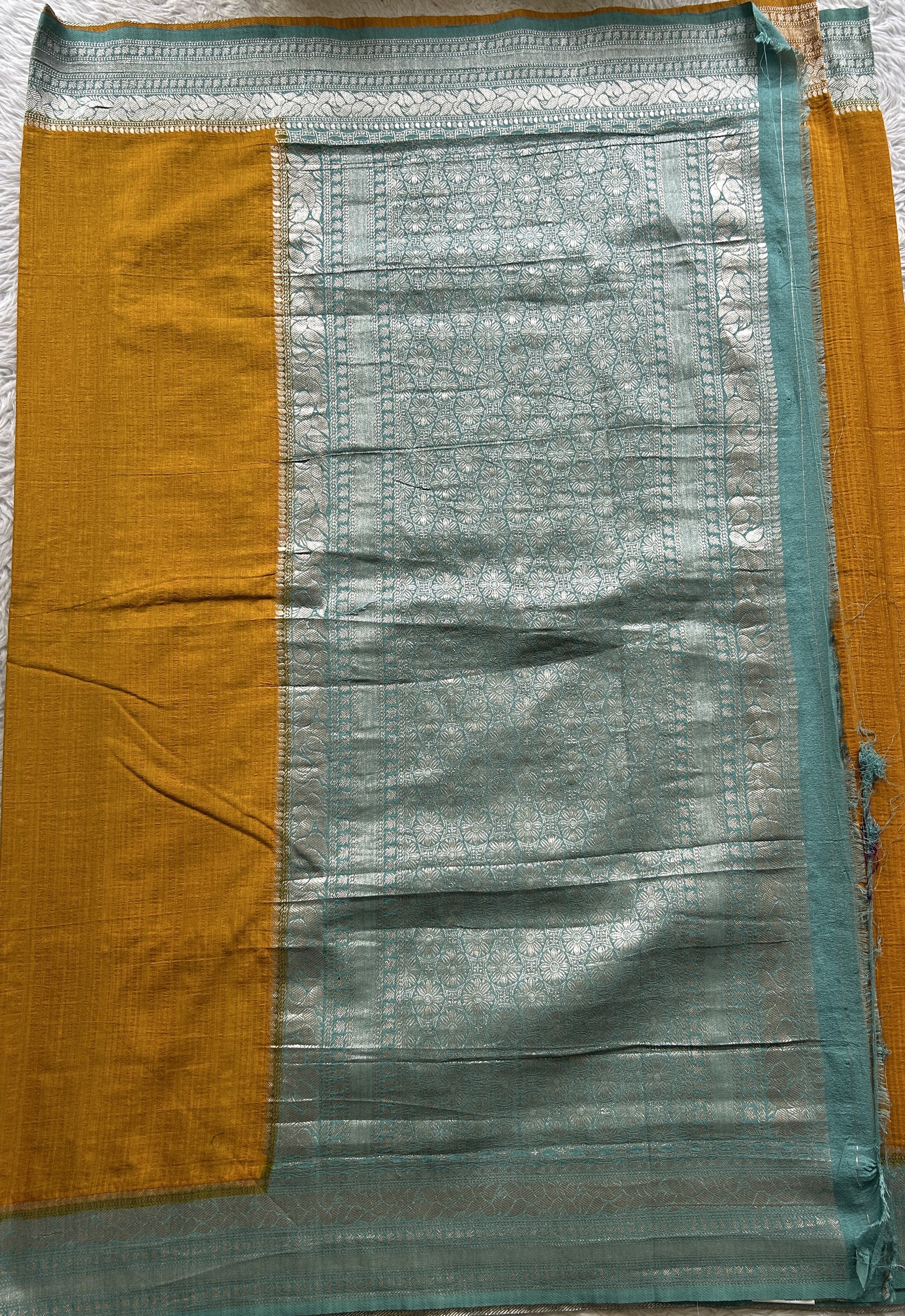 Semi Georgette Saree Yellow Colored Elegantly Paired with a Zari Border. - Sampradaya Designer Studio