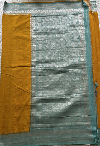 Semi Georgette Saree Yellow Colored Elegantly Paired with a Zari Border. - Sampradaya Designer Studio