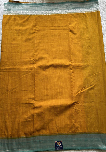 Semi Georgette Saree Yellow Colored Elegantly Paired with a Zari Border. - Sampradaya Designer Studio