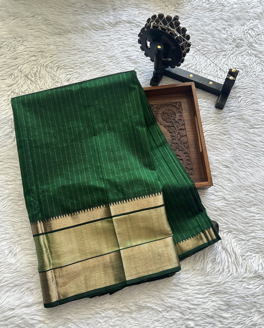 Mangalagiri Plain Pattu Saree Green colored complemented with a mangalagiri Border - Sampradaya Designer Studio