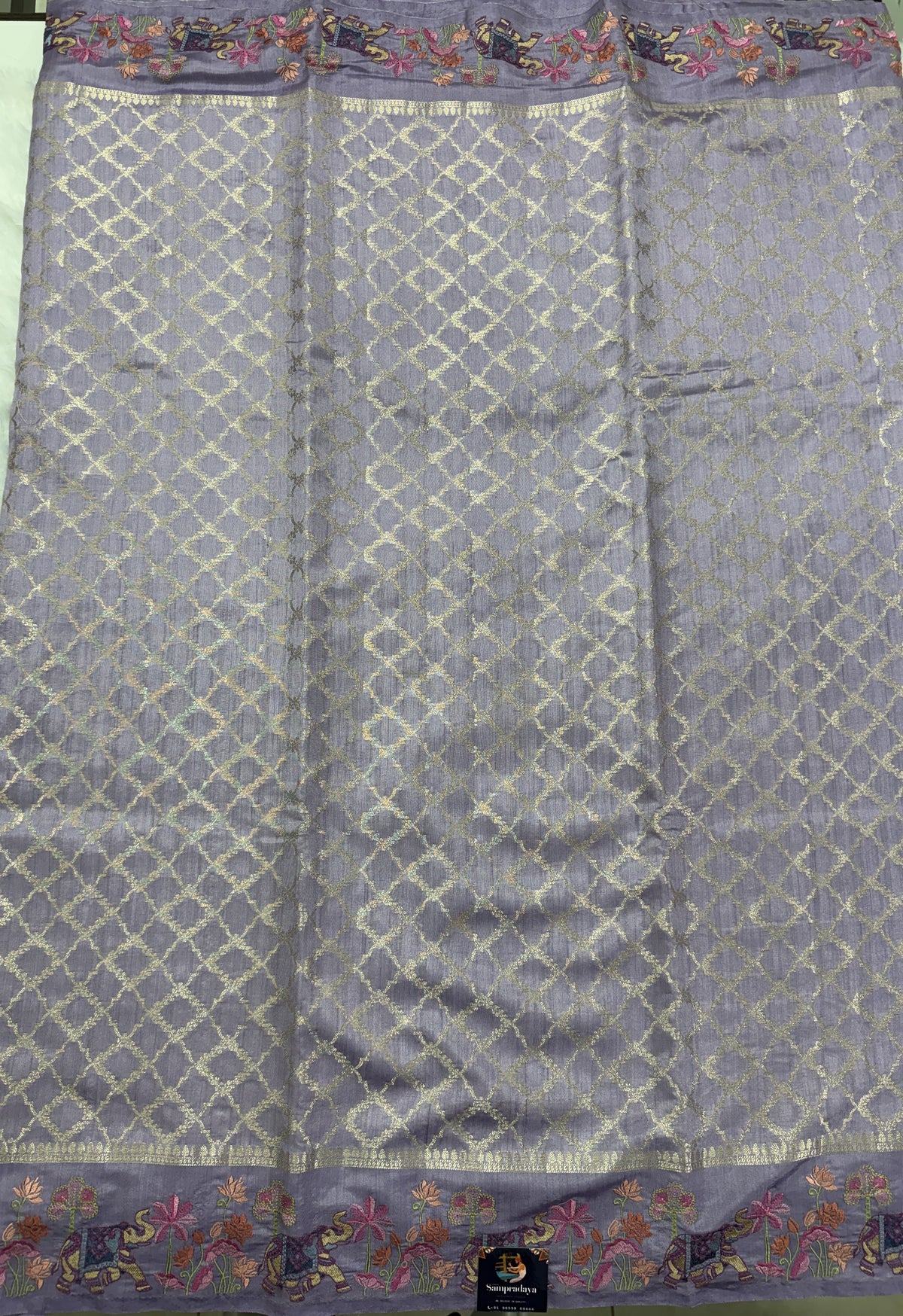 Pure Chiniya Silk Saree Lavender Colored Elegantly Paired with a Gold Zari Border