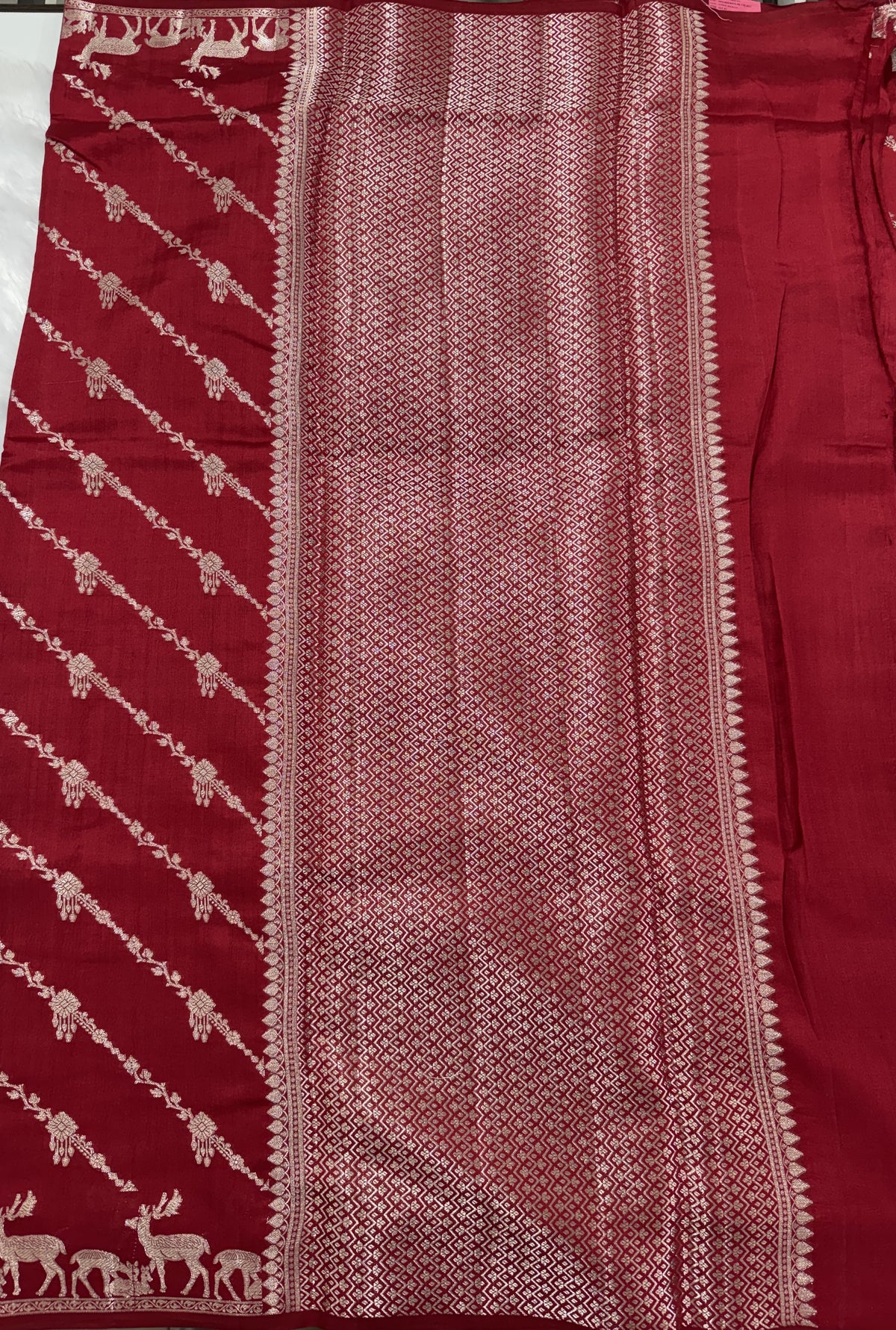 Pure Chiniya Silk Saree Red Colored Elegantly Paired with a Gold Zari Border.