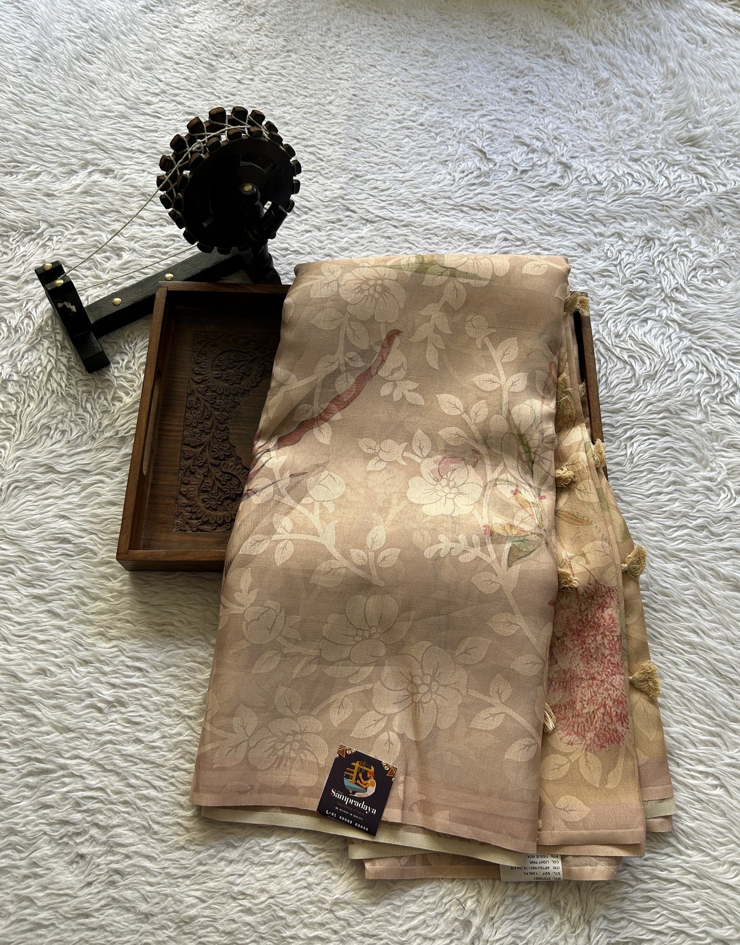 Banarasi Tissue Fancy Saree Light Peach Colored Paired with a Borderless. - Sampradaya Designer Studio