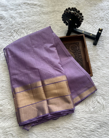 Mangalagiri Plain Pattu Saree Lilac colored complemented with a Zari Border - Sampradaya Designer Studio