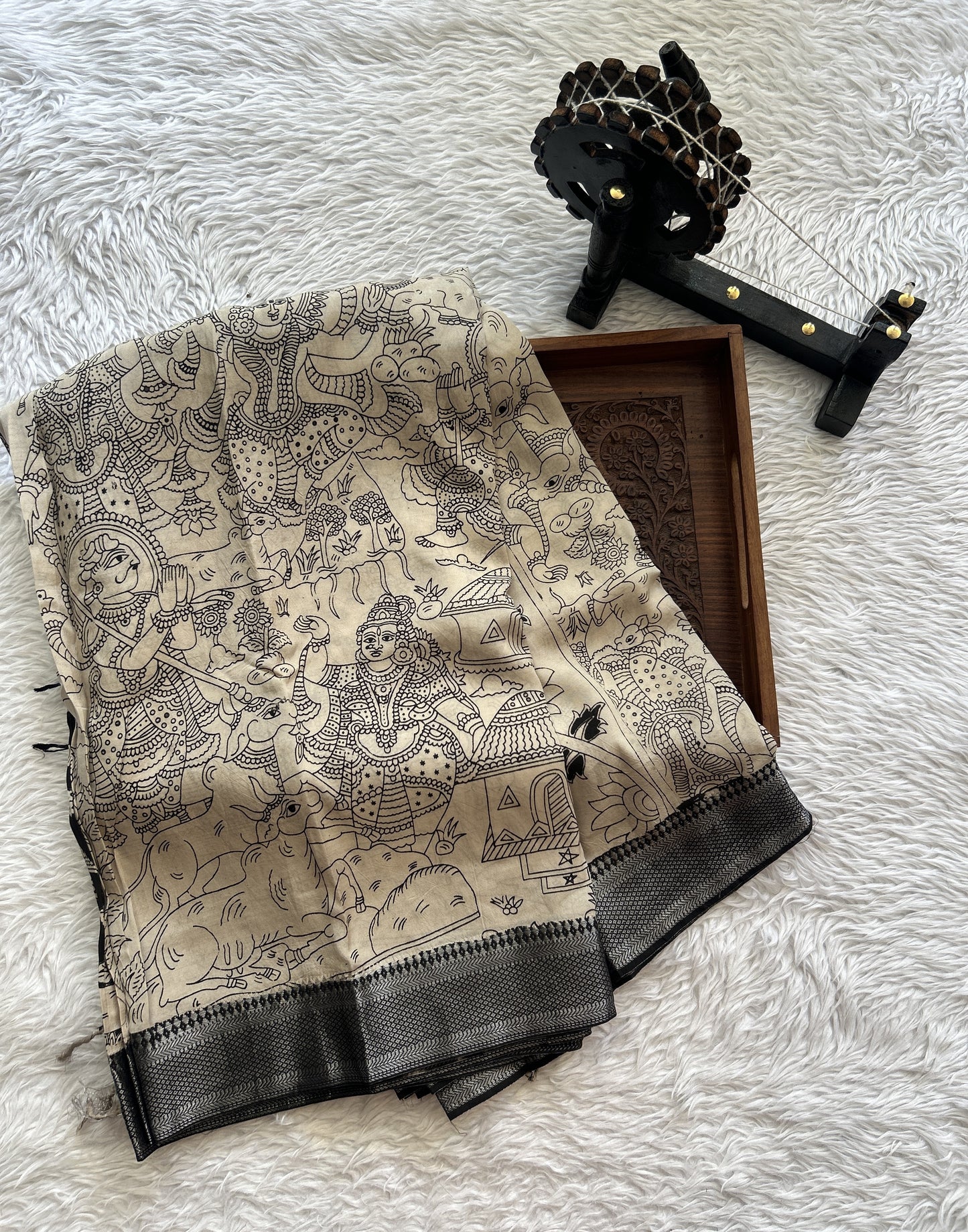 Mangalagiri Pen Kalamkari Saree Beige colored complemented with a Black Colored Zari border - Sampradaya Designer Studio