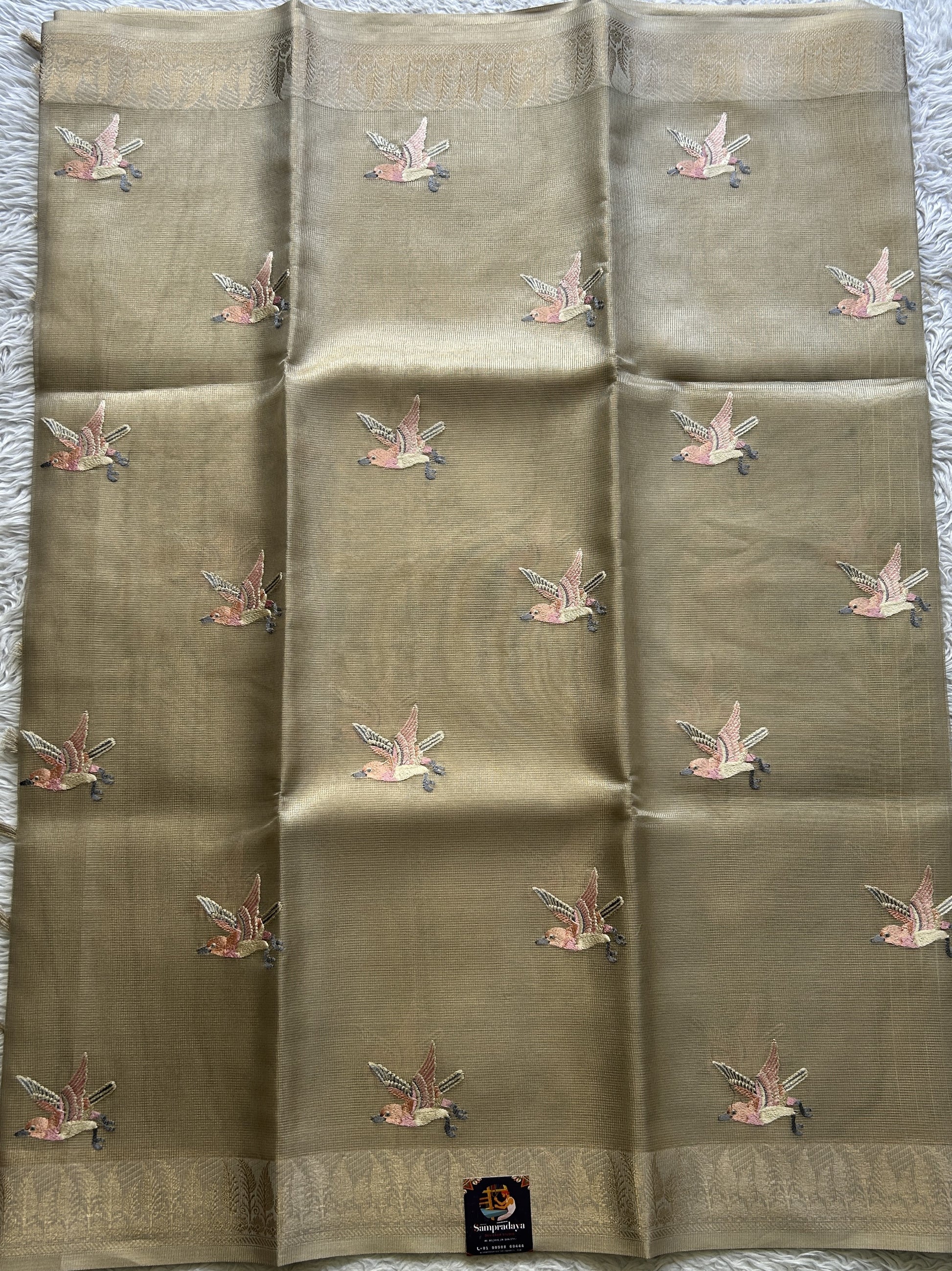Banarasi Tissue Fancy Saree Biscuit Colored Paired with a Zari Border. - Sampradaya Designer Studio