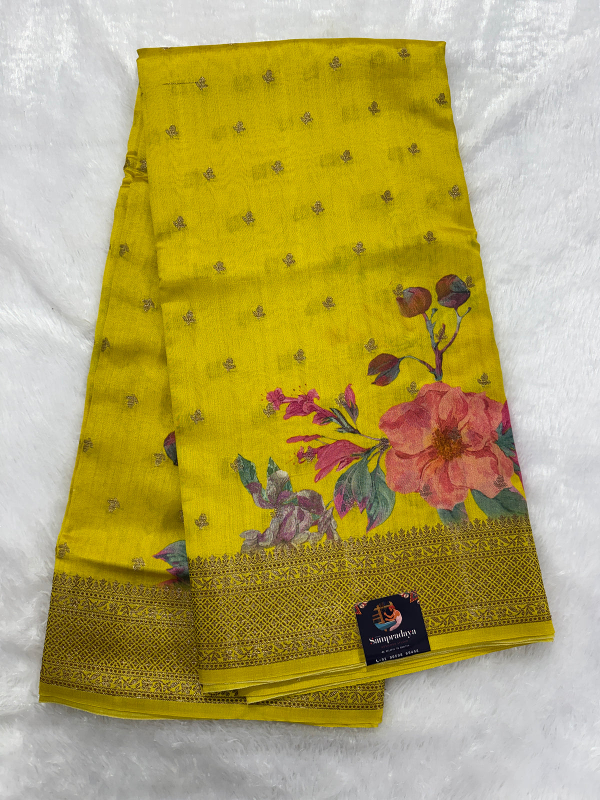 Pure Chiniya Silk Saree Yellow Colored Elegantly Paired with a Gold Zari Border.