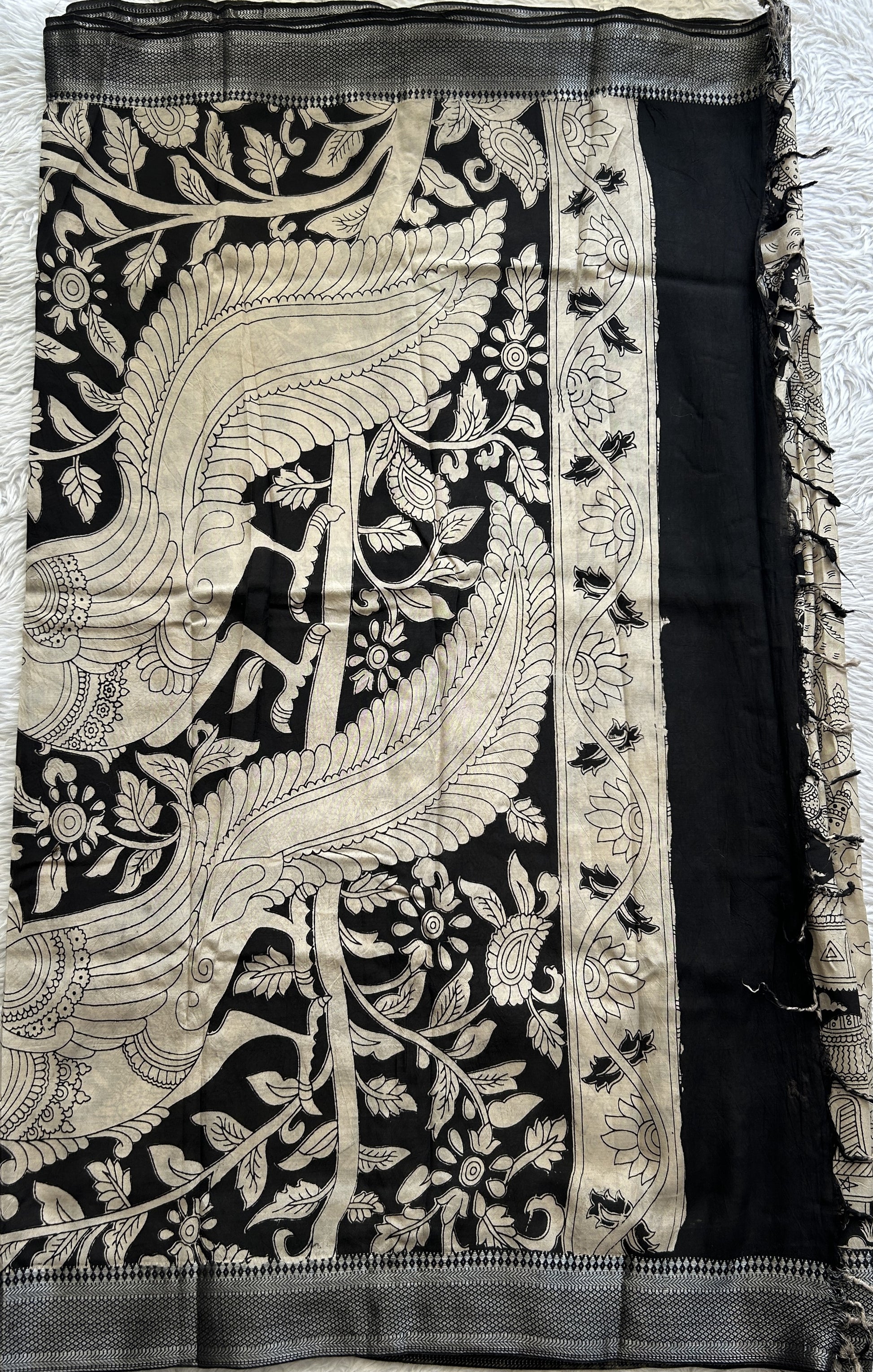 Mangalagiri Pen Kalamkari Saree Beige colored complemented with a Black Colored Zari border - Sampradaya Designer Studio