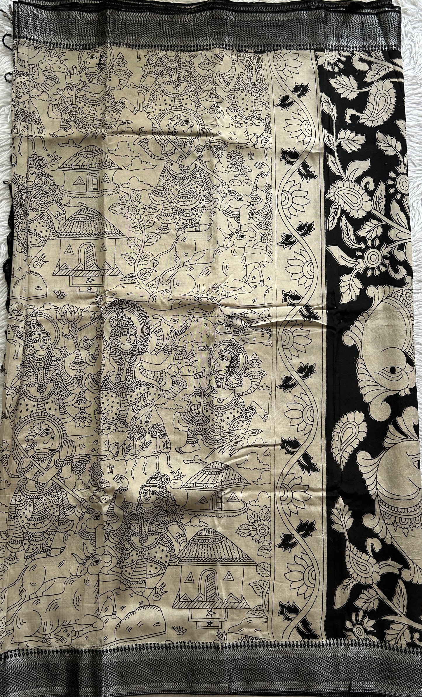 Mangalagiri Pen Kalamkari Saree Beige colored complemented with a Black Colored Zari border - Sampradaya Designer Studio