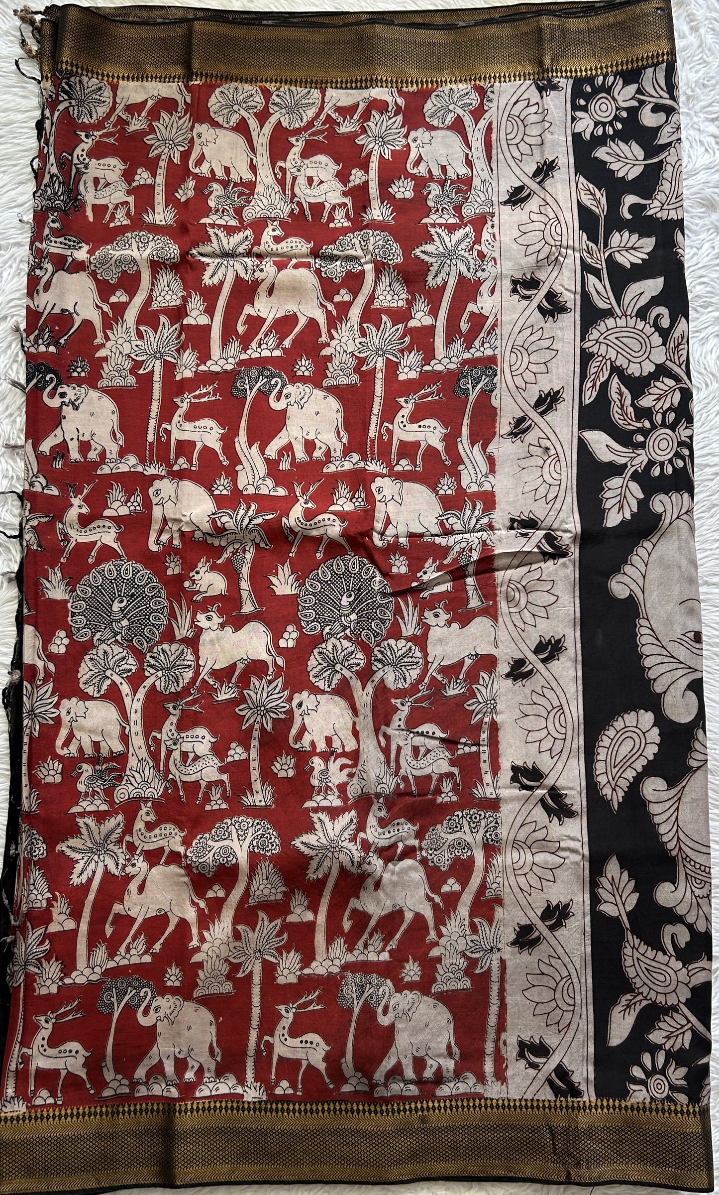 Mangalagiri Pen Kalamkari Saree Maroon colored complemented with a Black Colored Zari border - Sampradaya Designer Studio