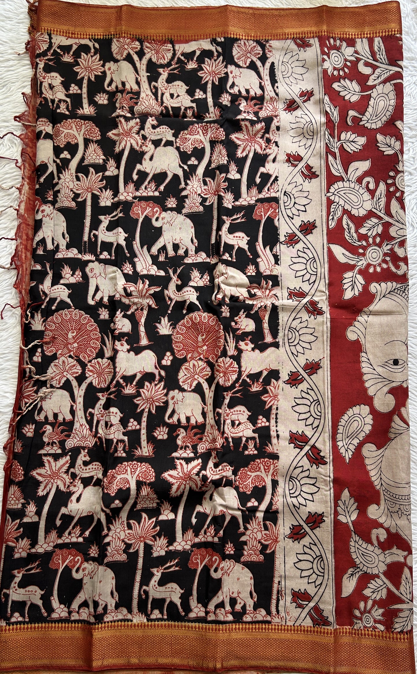 Mangalagiri Pen Kalamkari Saree Black colored complemented with a Zari border - Sampradaya Designer Studio