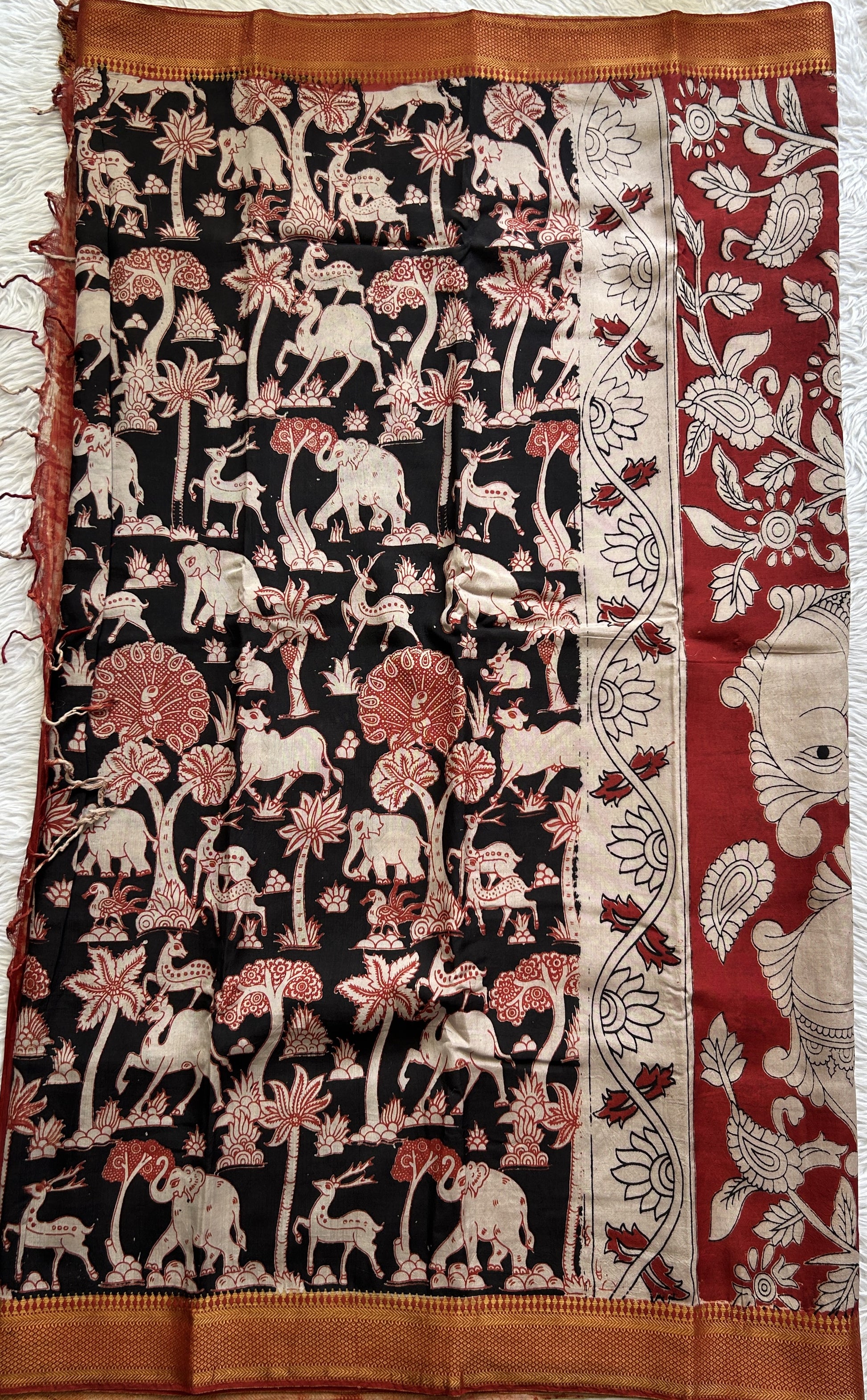 Mangalagiri Pen Kalamkari Saree Black colored complemented with a Zari border - Sampradaya Designer Studio