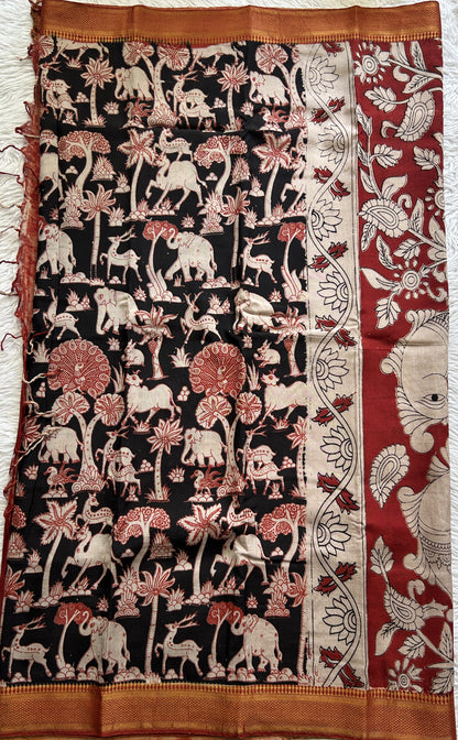 Mangalagiri Pen Kalamkari Saree Black colored complemented with a Zari border - Sampradaya Designer Studio