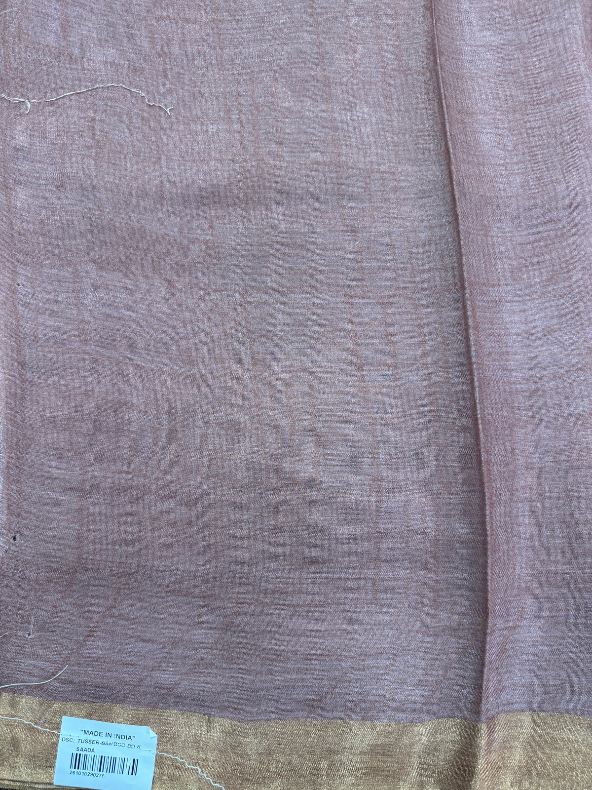 Pure Chiniya Silk Saree Brown Colored Elegantly Paired with a Gold Zari Border.
