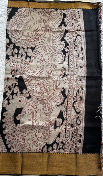 Mangalagiri Pen Kalamkari Saree Maroon colored complemented with a Black Color Zari border - Sampradaya Designer Studio