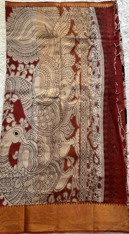 Mangalagiri Pen Kalamkari Saree Black colored complemented with a Maroon Colored Zari border - Sampradaya Designer Studio