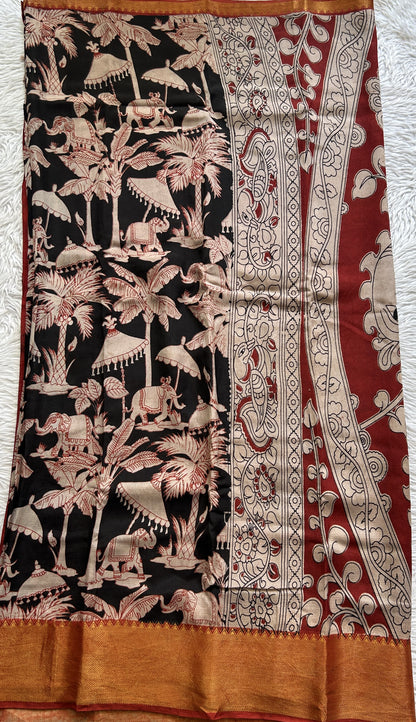 Mangalagiri Pen Kalamkari Saree Black colored complemented with a Maroon Colored Zari border - Sampradaya Designer Studio