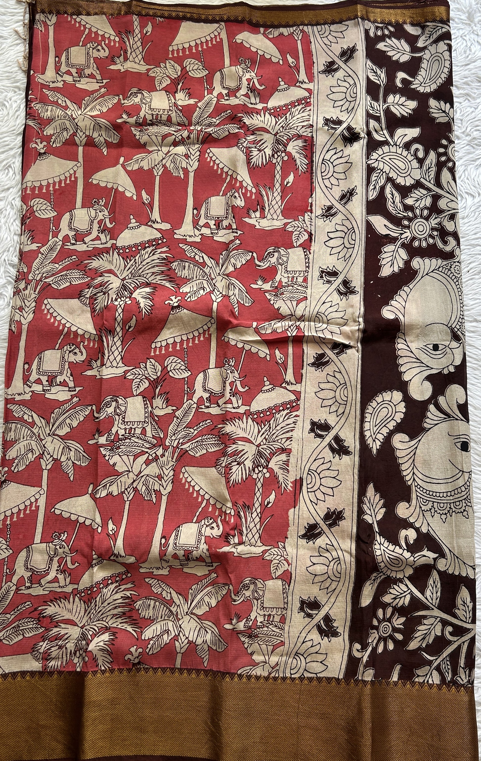 Mangalagiri Pen Kalamkari Saree Persian colored complemented with a Brown Colored Zari border - Sampradaya Designer Studio
