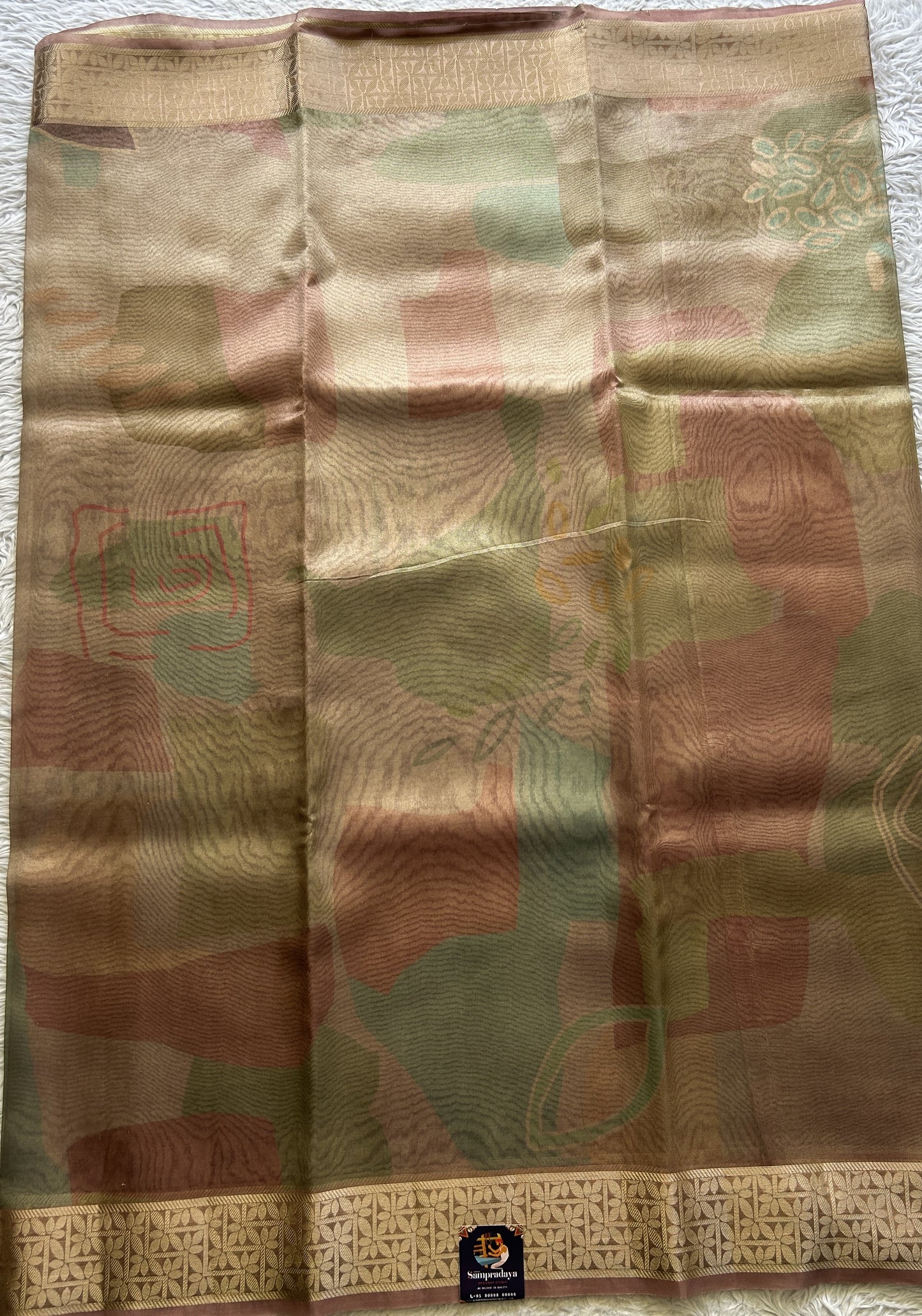 Banarasi Tissue Fancy Saree Onion Pink Colored Complemented with a Zari Border. - Sampradaya Designer Studio