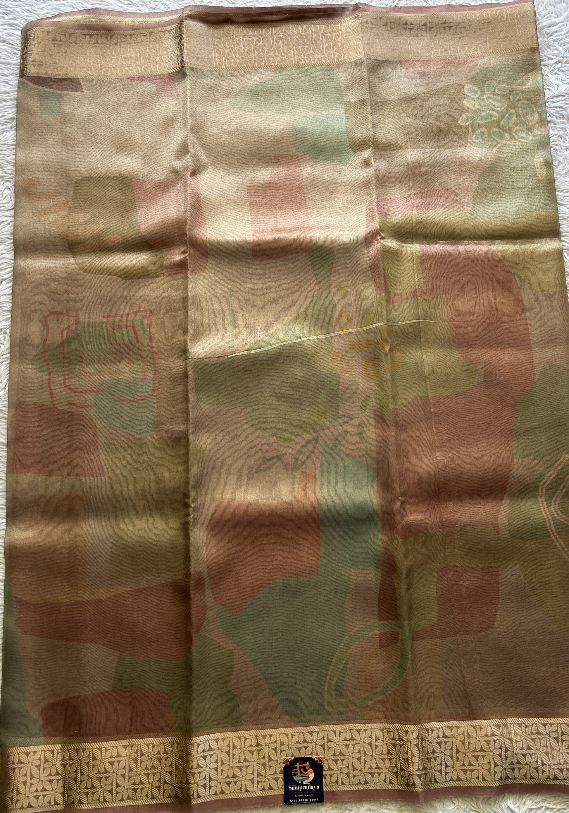Banarasi Tissue Fancy Saree Onion Pink Colored Complemented with a Zari Border. - Sampradaya Designer Studio