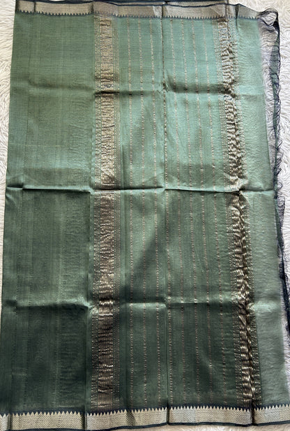 Mangalagiri Plain Pattu Saree Peacock Green colored complemented with a Zari Border - Sampradaya Designer Studio