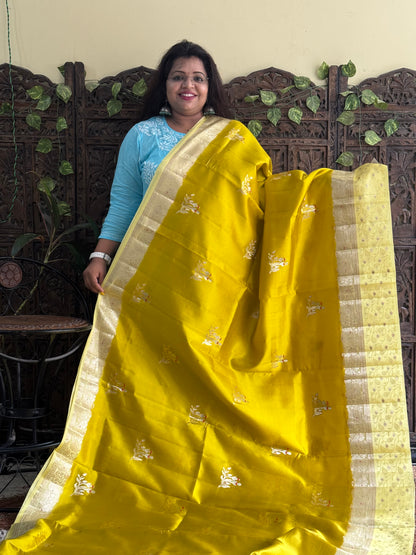 Chiniya Silk Saree Yellow Colored Elegantly Paired With a Zari Border - Sampradaya Designer Studio