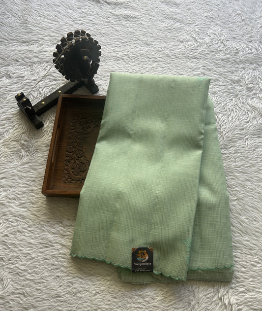 Silk kota Saree Mint Mist colored Complemented with a Scallop Border. - Sampradaya Designer Studio