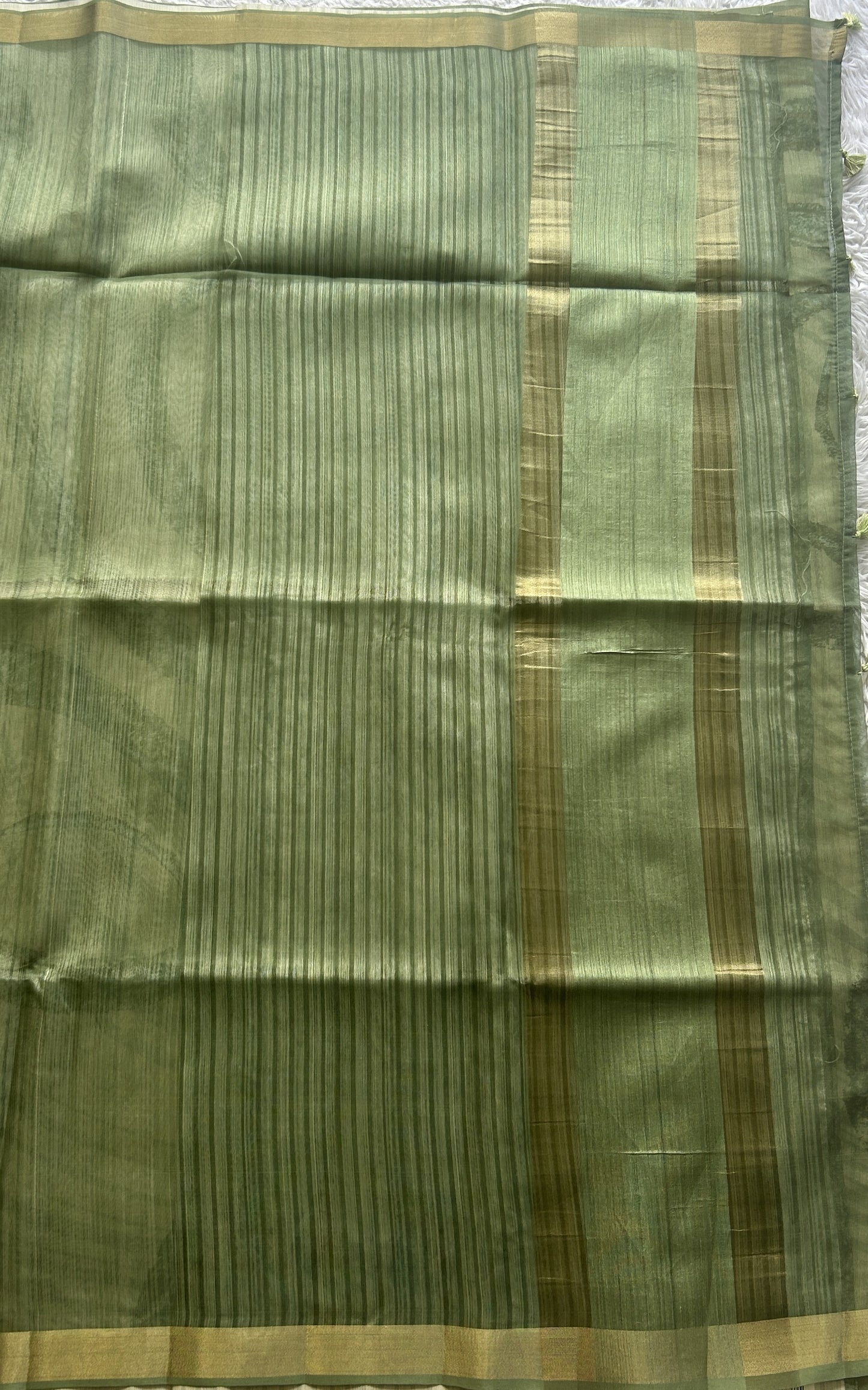 Semi Tussar Saree Olive Green Colored Elegantly Paired with a Zari Border. - Sampradaya Designer Studio