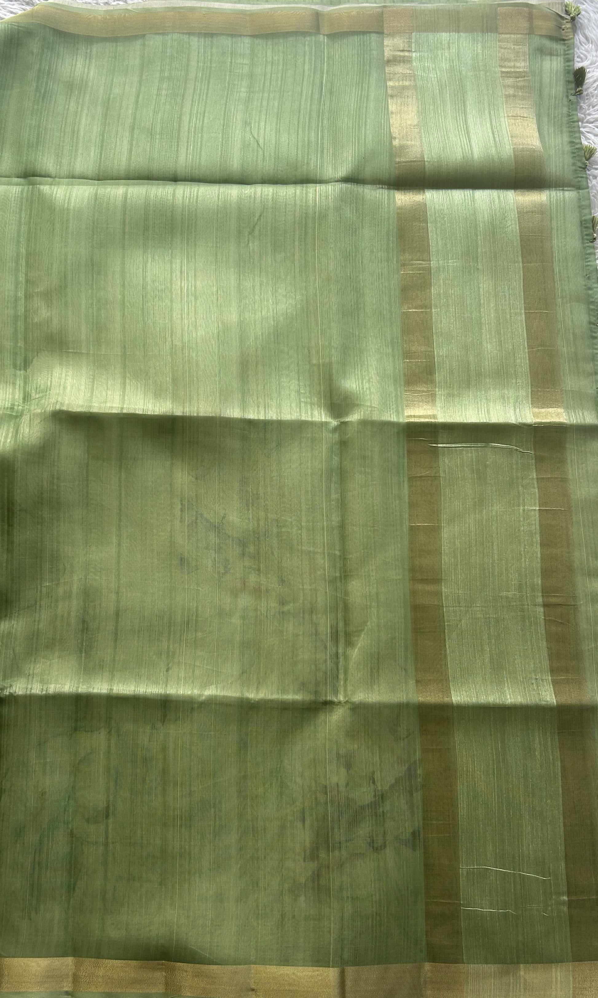 Semi Tussar Saree Leaf Green Colored Elegantly Paired with a Zari Border. - Sampradaya Designer Studio