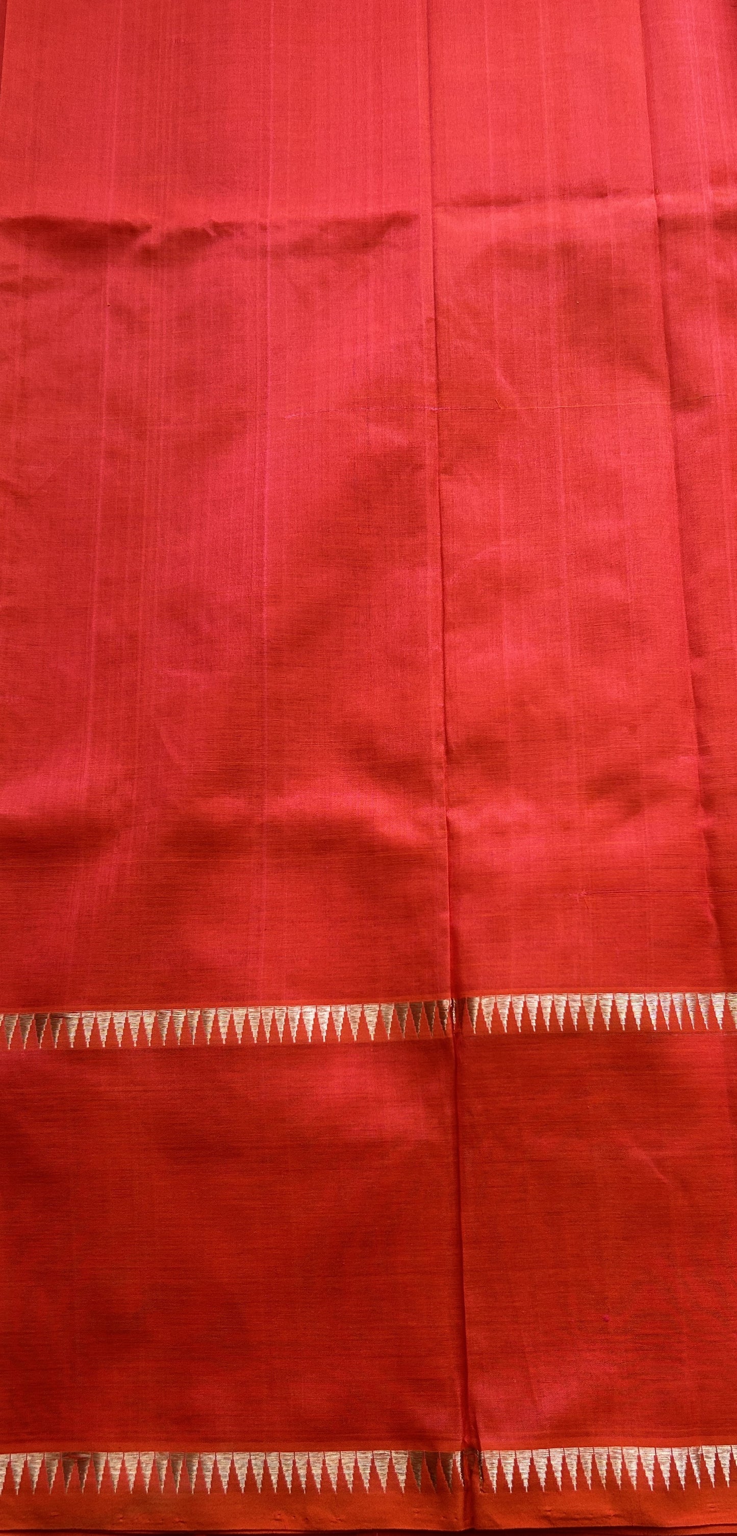 Mangalagiri Plain Pattu Saree Red Orange colored complemented with a mangalagiri Gap Border - Sampradaya Designer Studio