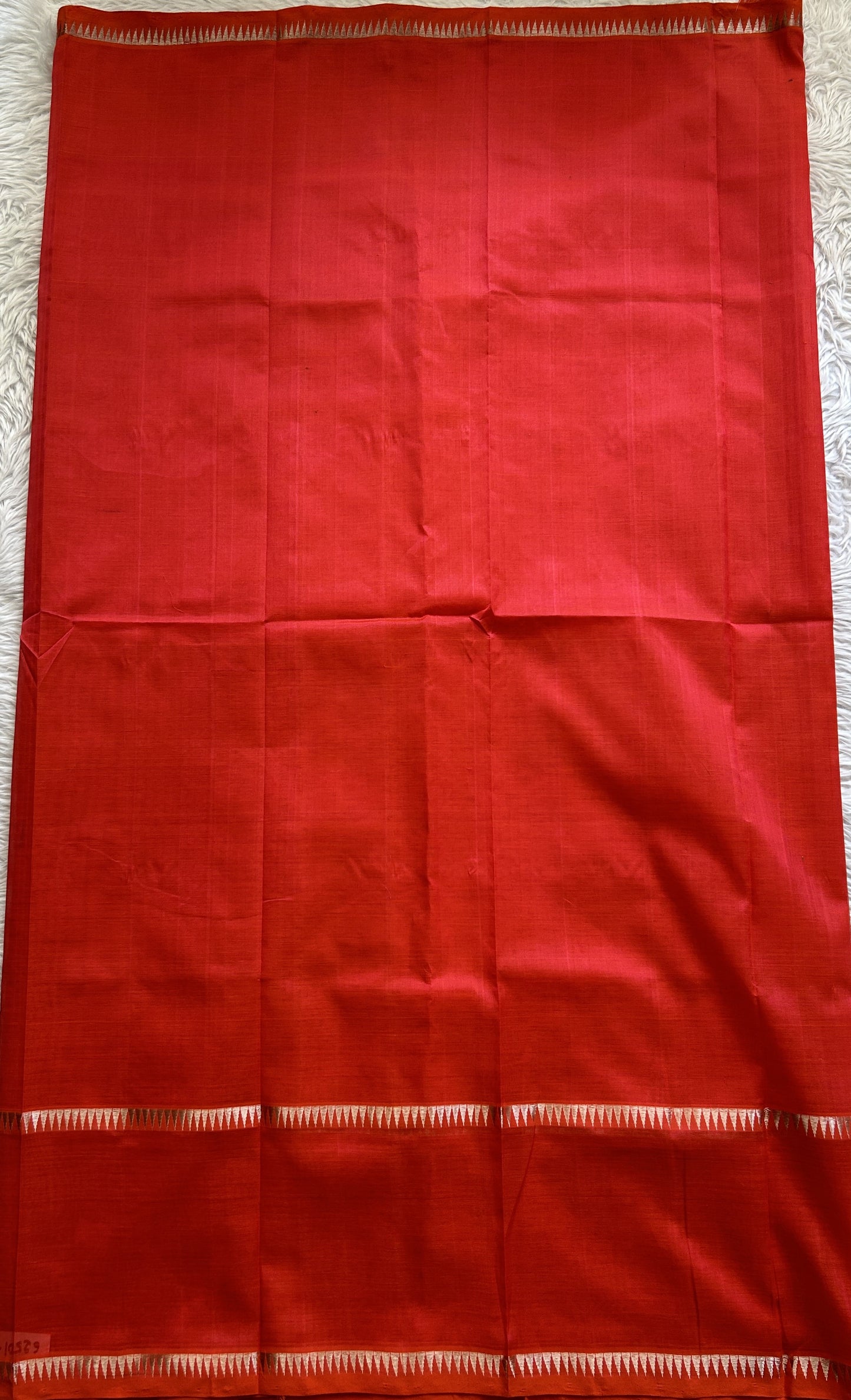 Mangalagiri Plain Pattu Saree Red Orange colored complemented with a mangalagiri Gap Border - Sampradaya Designer Studio