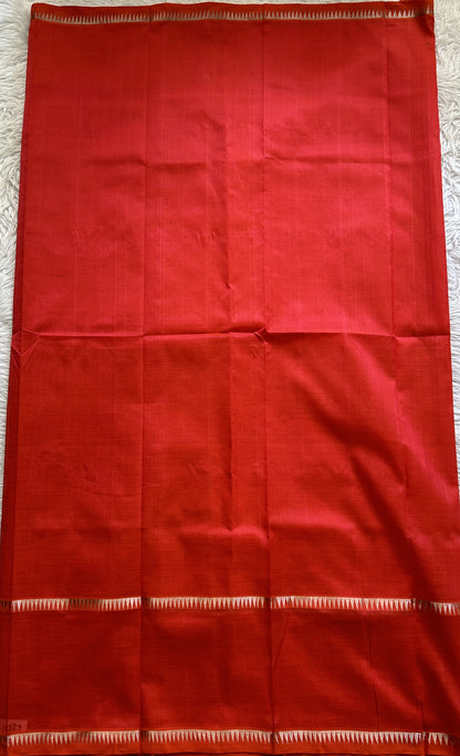 Mangalagiri Plain Pattu Saree Red Orange colored complemented with a mangalagiri Gap Border - Sampradaya Designer Studio